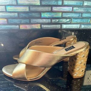 Size 9.5 WHBM sandals. Gold with silver heel accent.
